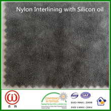 La mejor calidad de carbón de cola de nylon interlínea con aceite de silicona para PVC blando